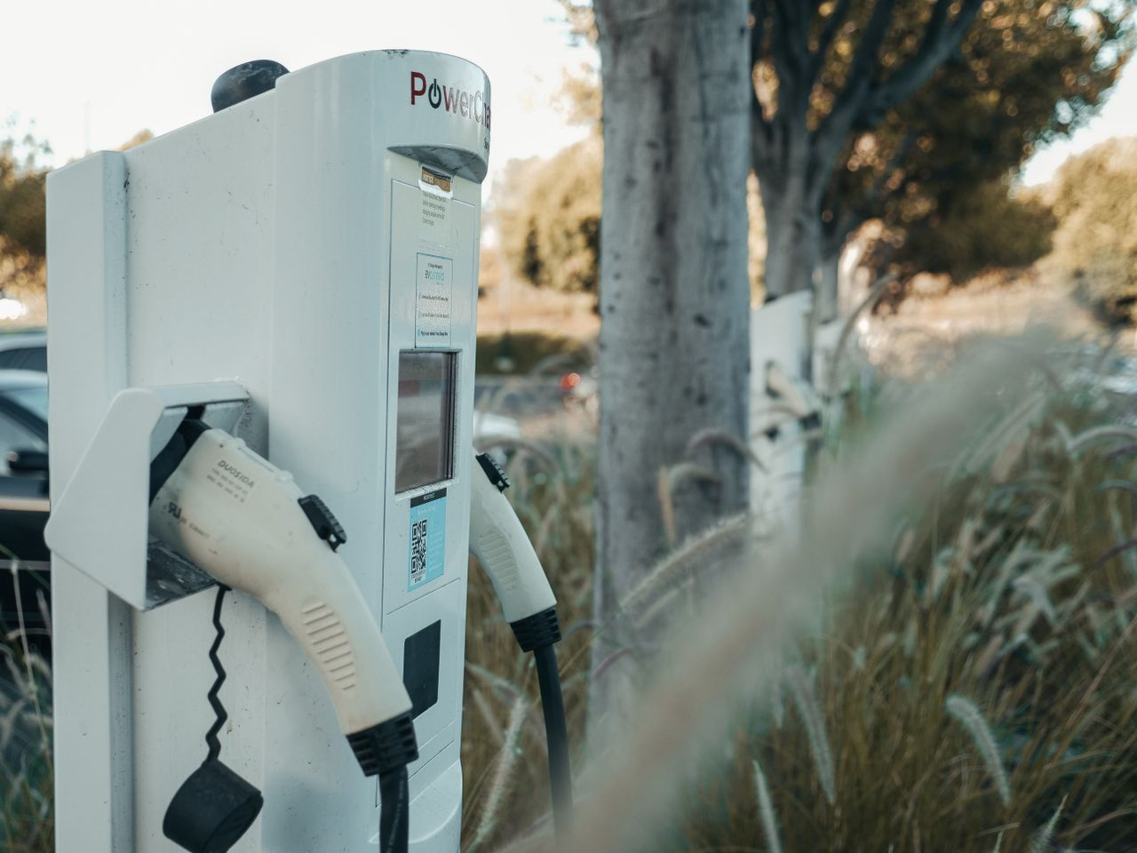 Crafting Captivating Headlines: Your awesome post title goes here Electric vehicle charging station in an outdoor natural setting, highlighting sustainable technology.